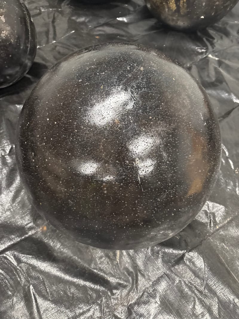 Black 20-inch concrete atlas stone, 305 lb, in stock at Per Aspera Strength