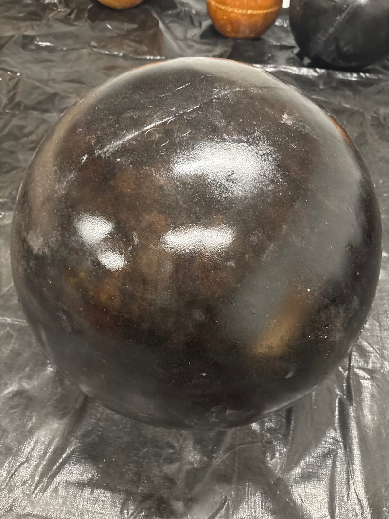 Black 22-inch concrete atlas stone, 408 lb, in stock at Per Aspera Strength
